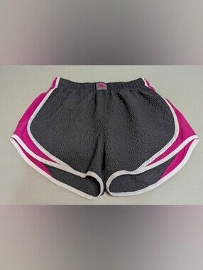 Pink and black Nike shorts, medium